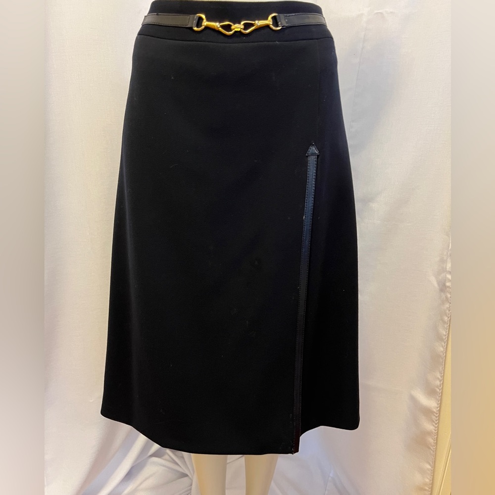 Celine vintage black skirt with gold logo chain half belt detail. US Size 12
